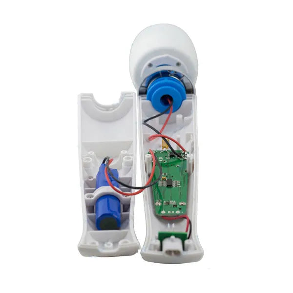 Internal view of a counterfeit Magic Wand device showing poor wiring