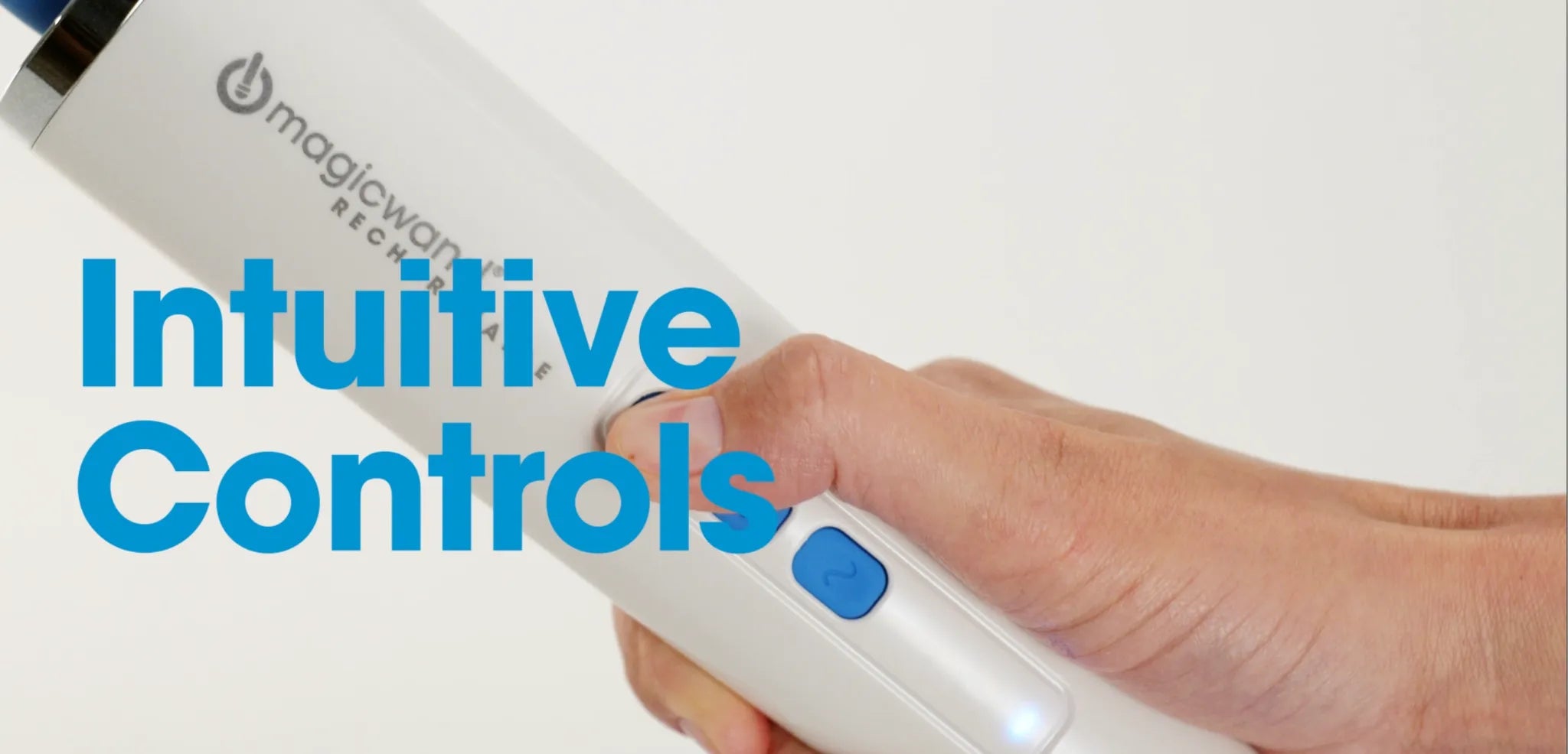 Hand adjusting controls on the Magic Wand Rechargeable massager